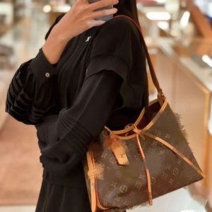 Replica Designer Louis Vuitton Discolored Cowhide Middle-Aged Armpit One-Shoulder Bag